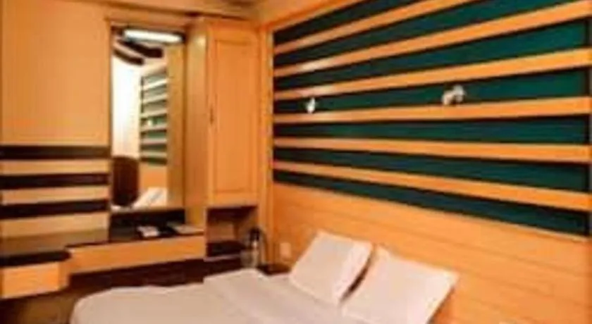 Bed in Hotel Hilltop Towers