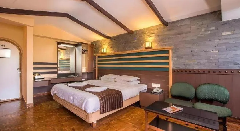 Bed in Hotel Hilltop Towers