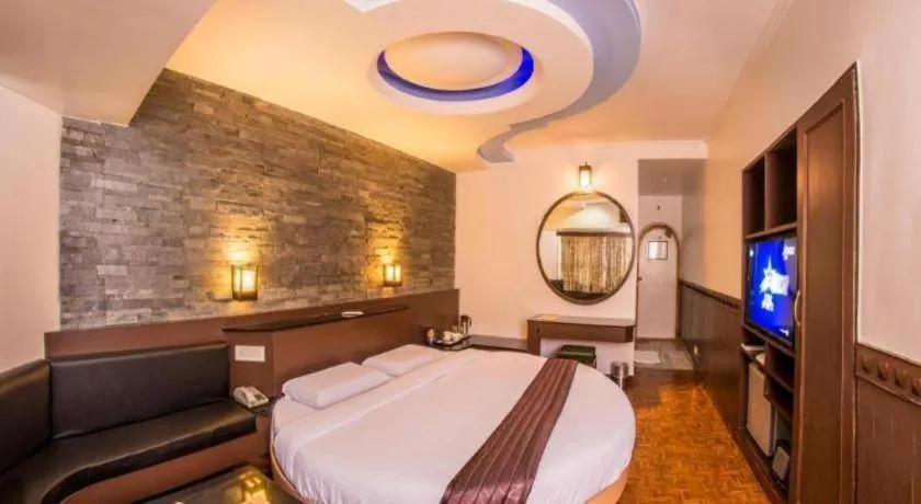 Bed in Hotel Hilltop Towers