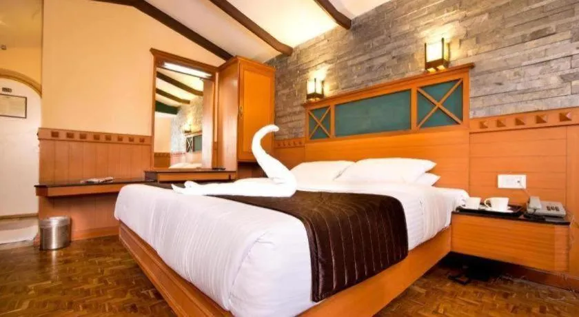 Bed in Hotel Hilltop Towers