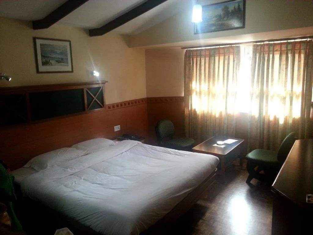 Bed in Hotel Hilltop Towers