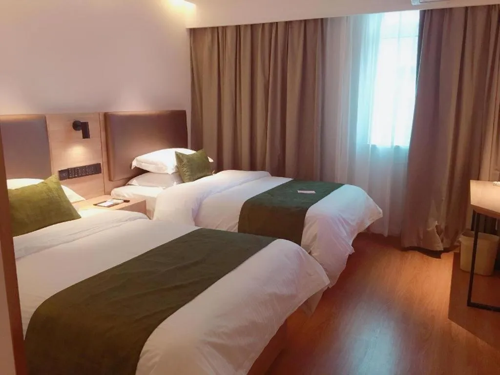 Bed in GreenTree Inn Changzhou Times Plaza Business Hotel