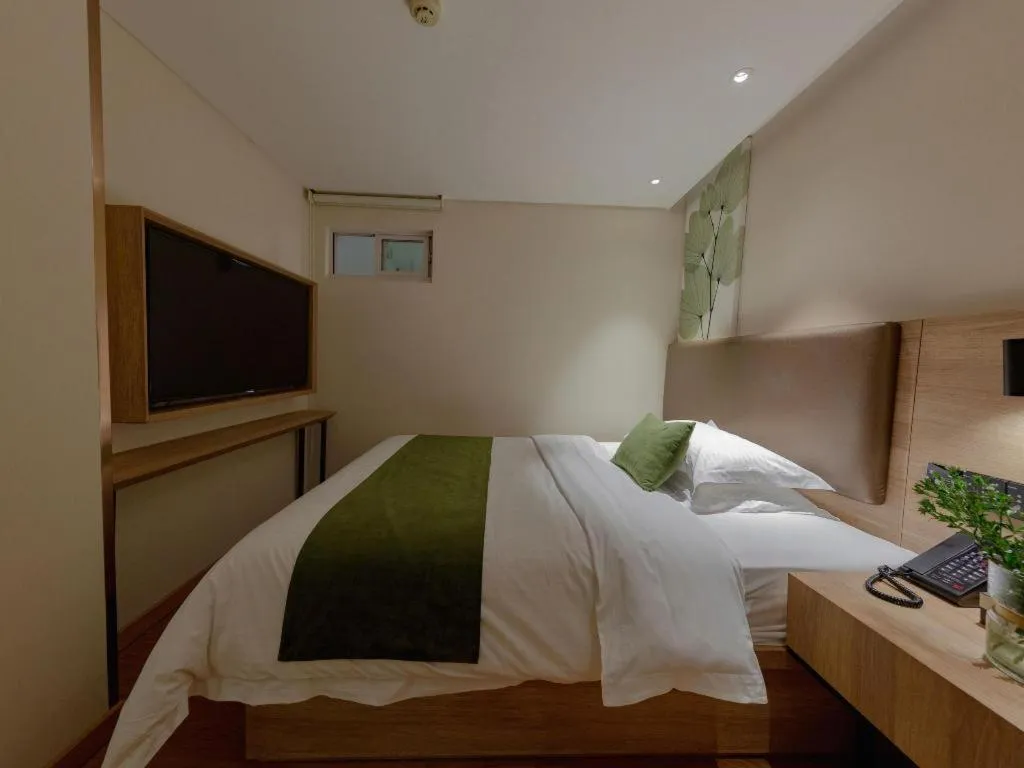 Bed in GreenTree Inn Changzhou Times Plaza Business Hotel