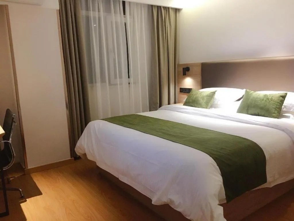 Bed in GreenTree Inn Changzhou Times Plaza Business Hotel