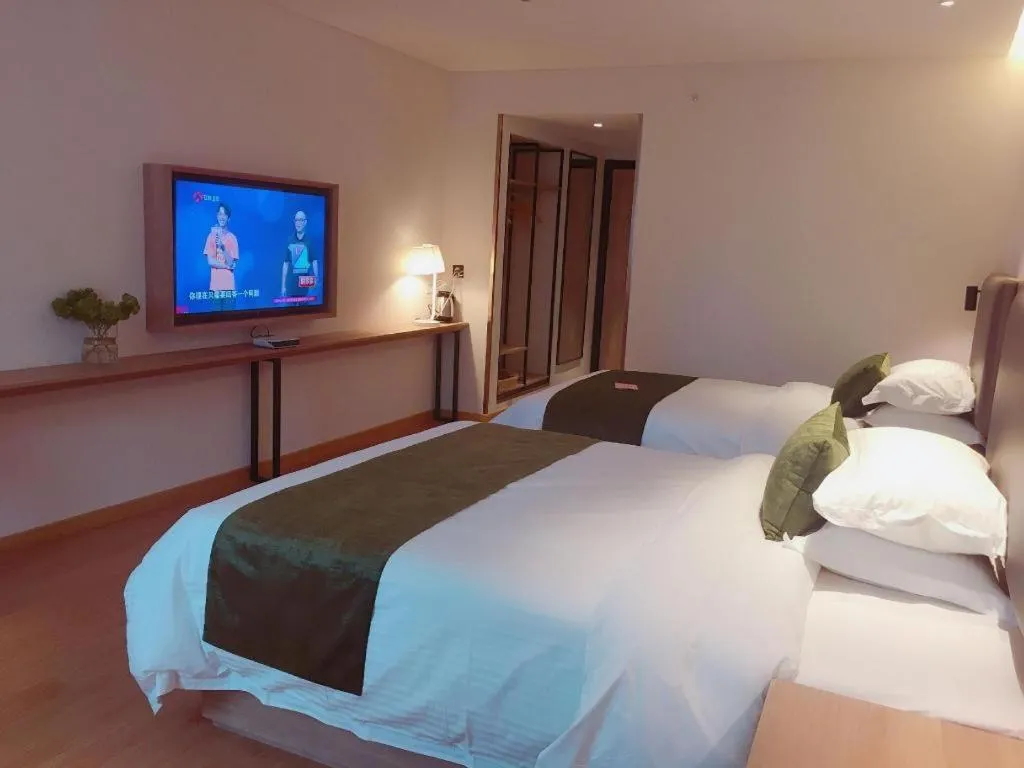 Bed in GreenTree Inn Changzhou Times Plaza Business Hotel
