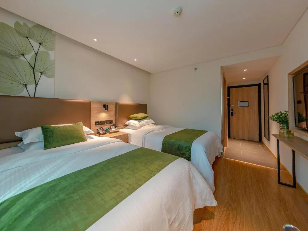 Bed in GreenTree Inn Changzhou Times Plaza Business Hotel