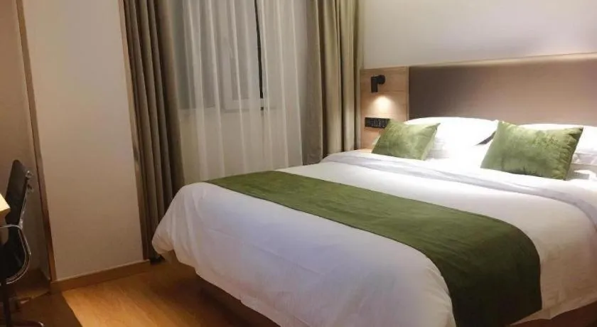 Bed in GreenTree Inn Changzhou Times Plaza Business Hotel