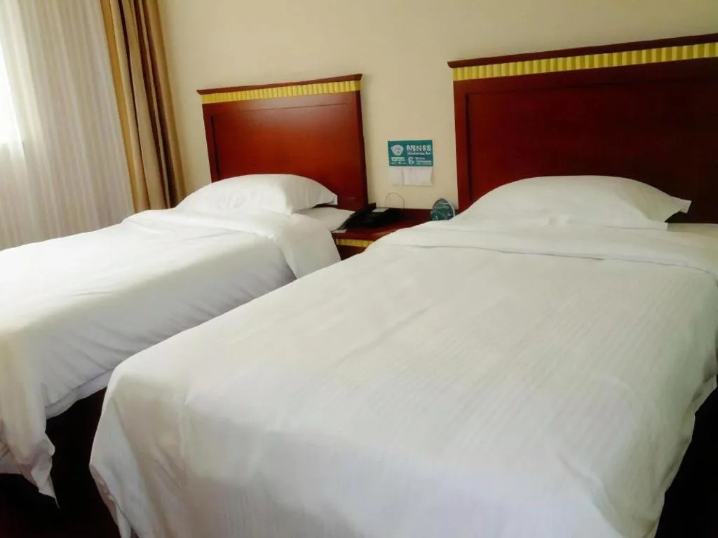 Bed in GreenTree Inn Changzhou Times Plaza Business Hotel