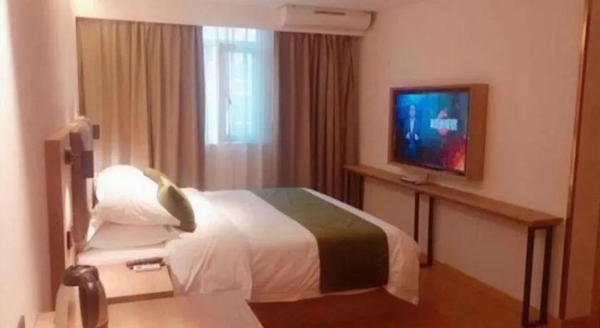 Bed in GreenTree Inn Changzhou Times Plaza Business Hotel
