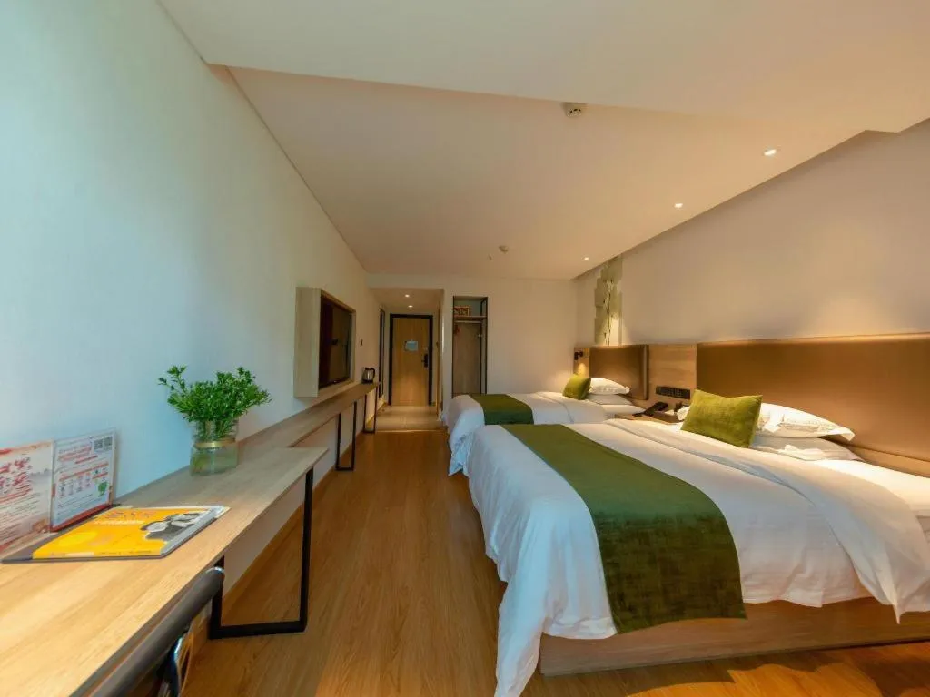 Bed in GreenTree Inn Changzhou Times Plaza Business Hotel