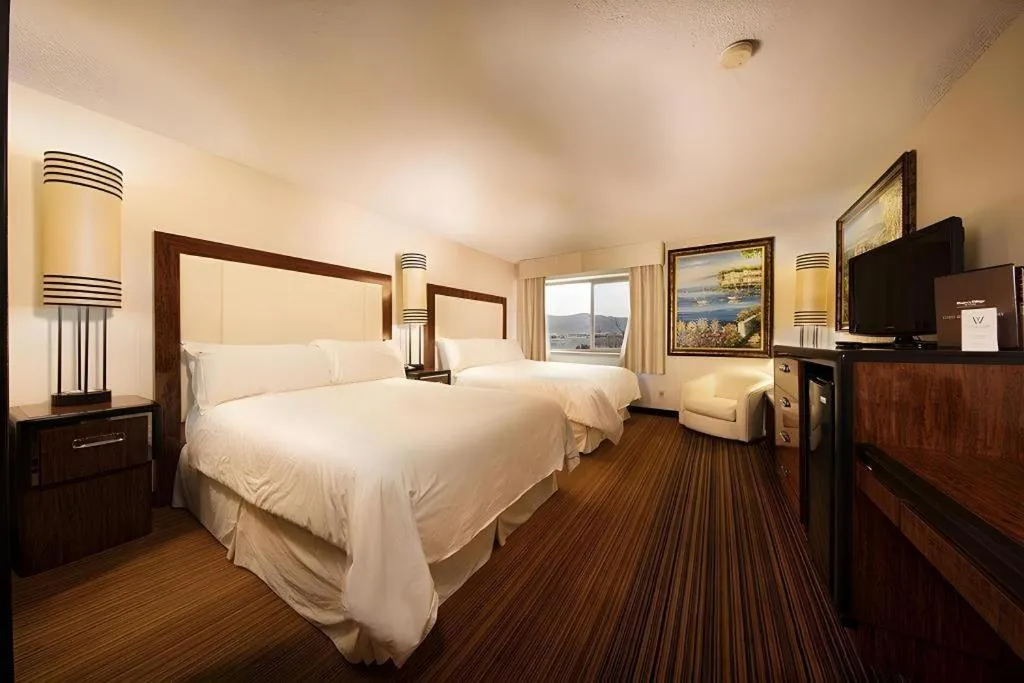 Bed in Western Village Inn And Casino