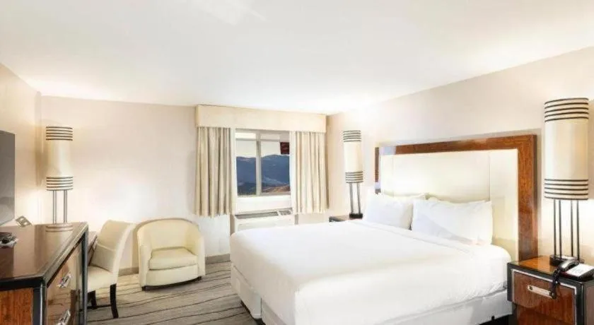 Bed in Western Village Inn And Casino