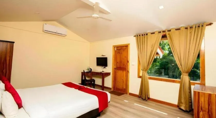 Bed in Majestic Beach Comforts - Beachfront