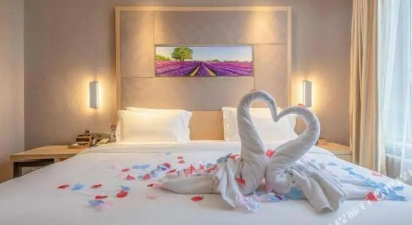 Bed in Lavande Hotel Qingdao North Station Siliu South Road