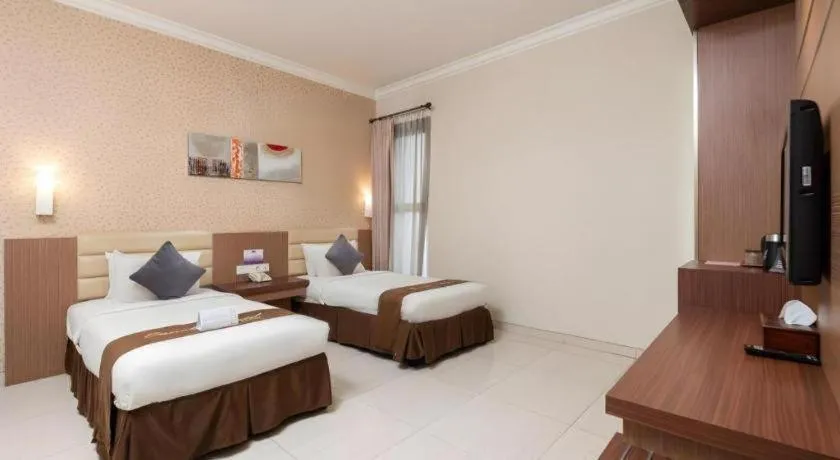 Bed in Life Emerald Hotel Surabaya