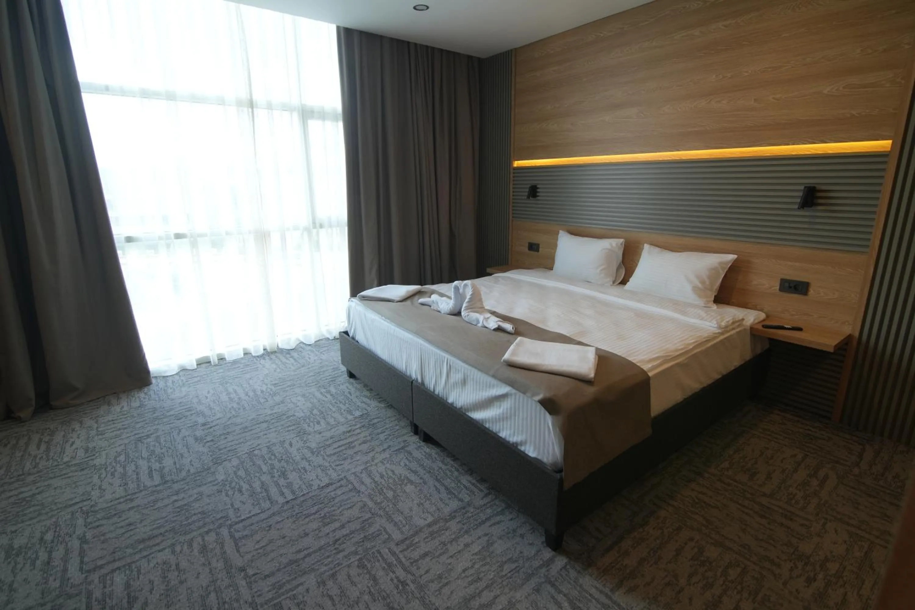 Bed in Kent Room Hotel