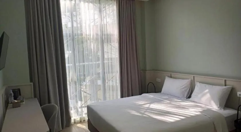 Bed in La Cama Boutique Hotel