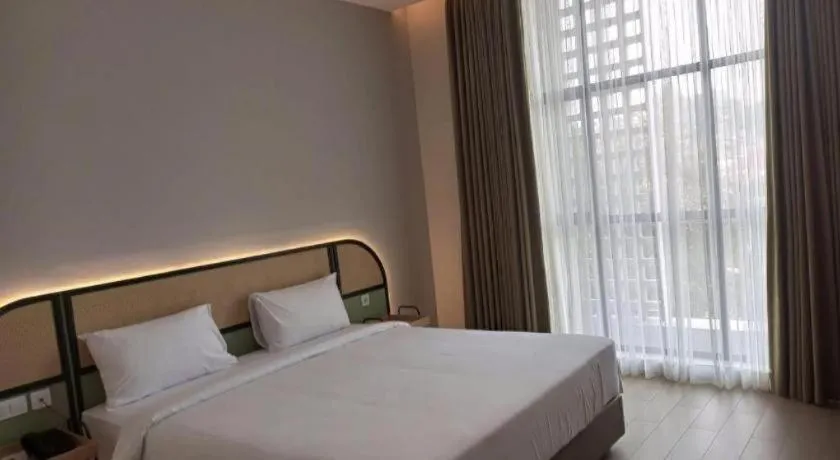 Bed in La Cama Boutique Hotel