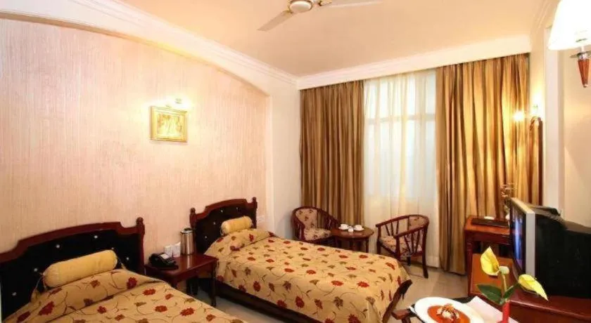 Bed in Hotel Grand President