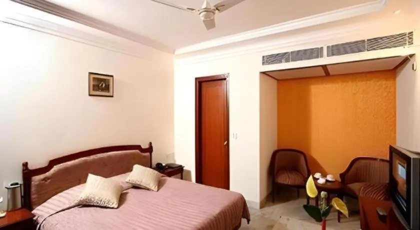 Bed in Hotel Grand President