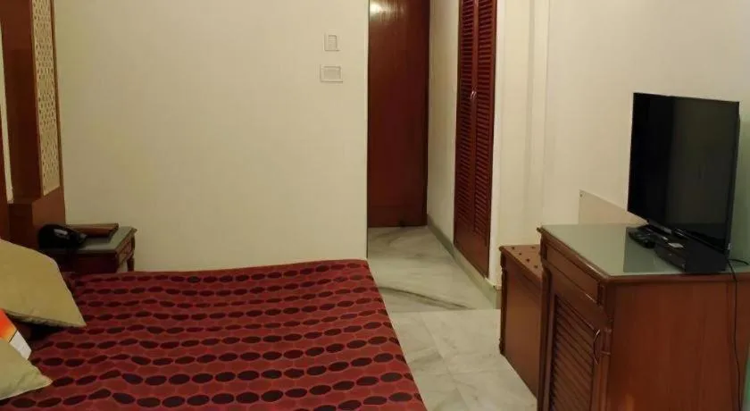 Bed in Hotel Grand President