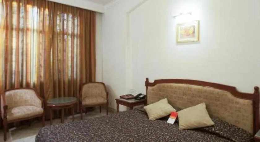 Bed in Hotel Grand President