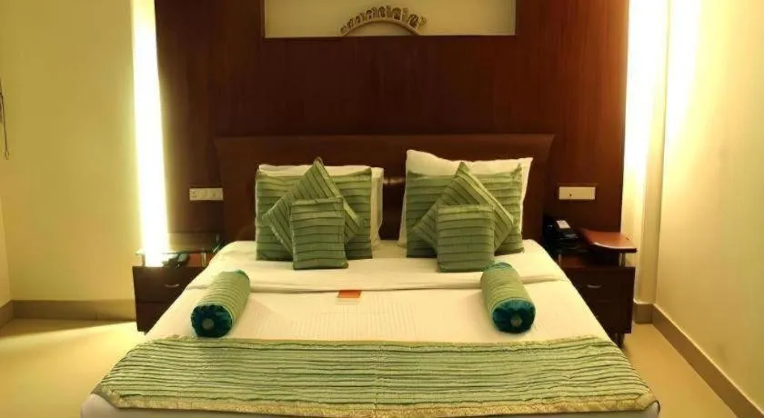 Bed in Hotel Grand President