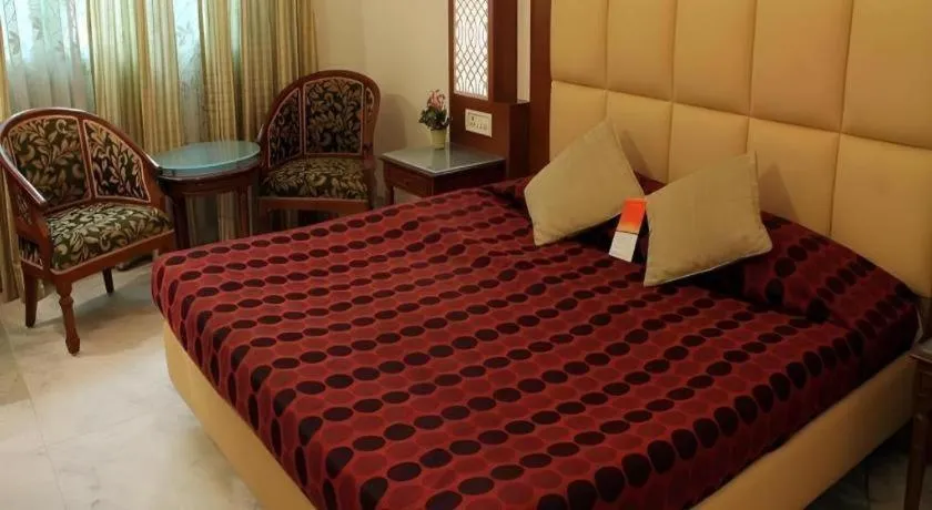 Bed in Hotel Grand President