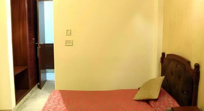 Bed in Hotel Grand President