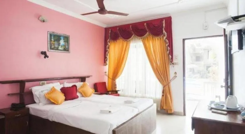 Bed in Jeevan Ayurvedic Beach Resort