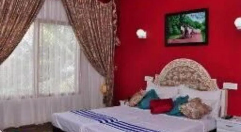Bed in Jeevan Ayurvedic Beach Resort