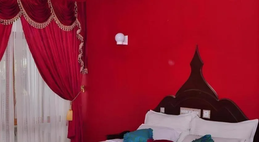 Bed in Jeevan Ayurvedic Beach Resort