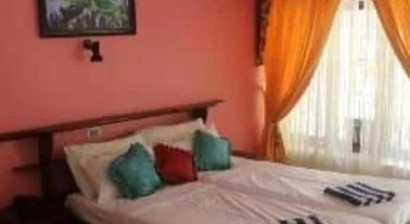 Bed in Jeevan Ayurvedic Beach Resort