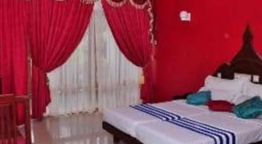 Bed in Jeevan Ayurvedic Beach Resort
