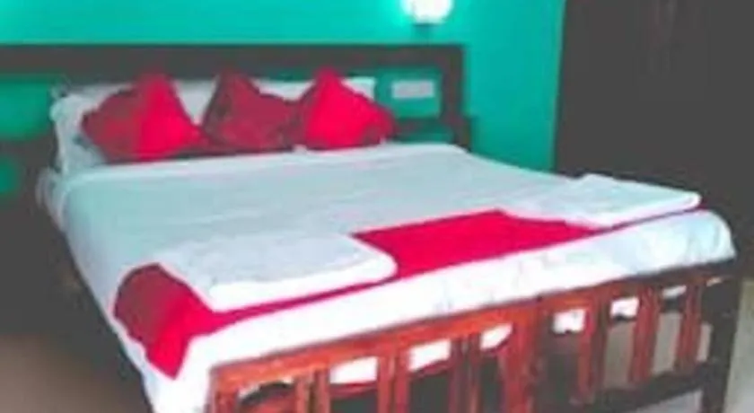 Bed in Jeevan Ayurvedic Beach Resort