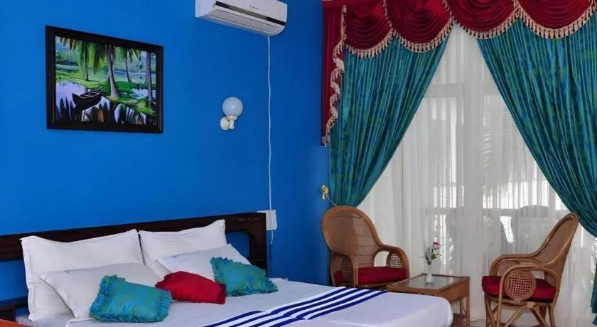 Bed in Jeevan Ayurvedic Beach Resort