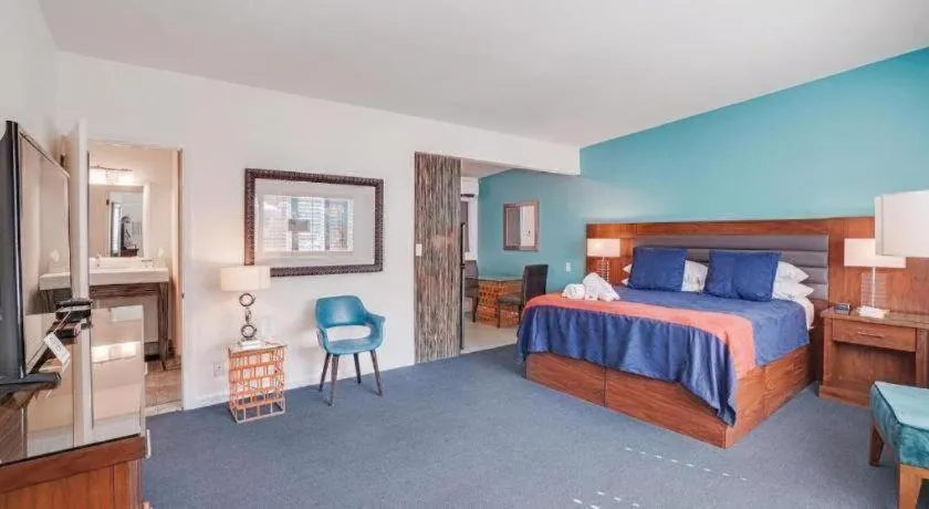 Bed in INNdulge Iconic Gay Men's Resort