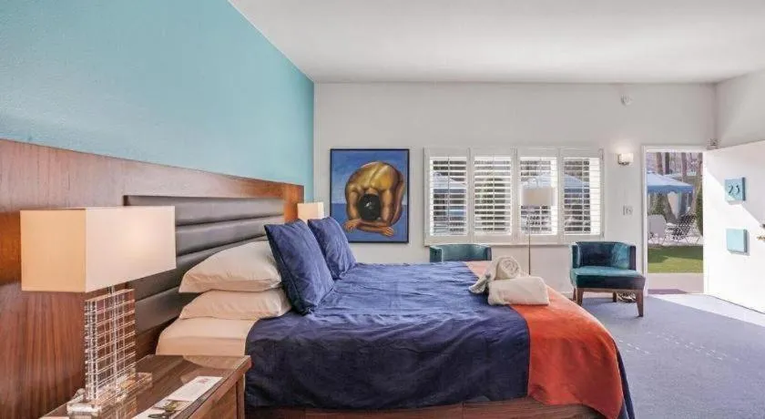 Bed in INNdulge Iconic Gay Men's Resort