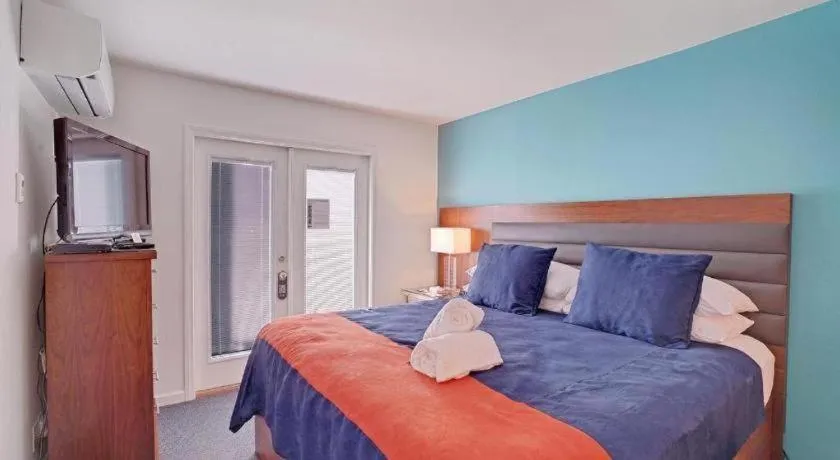 Bed in INNdulge Iconic Gay Men's Resort