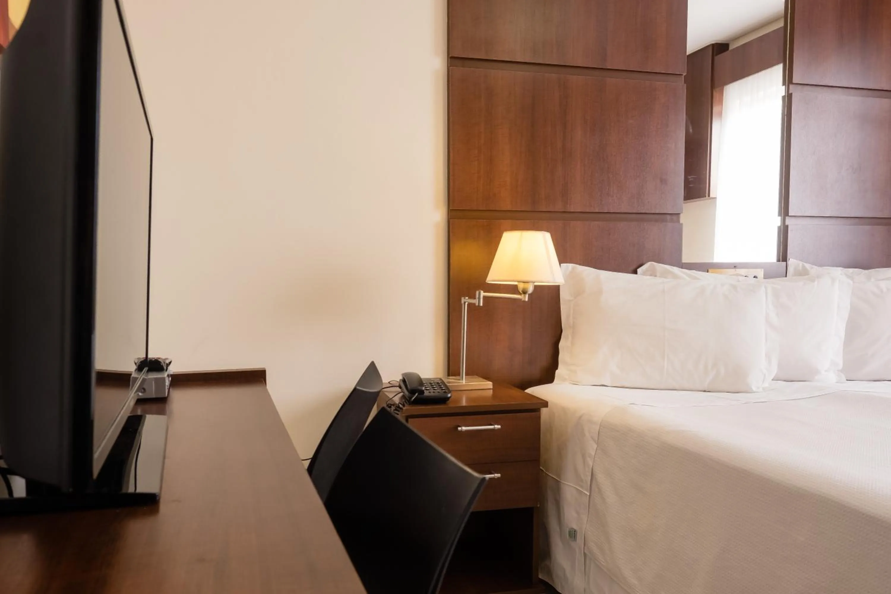 Bed in Ibituruna Center Hotel