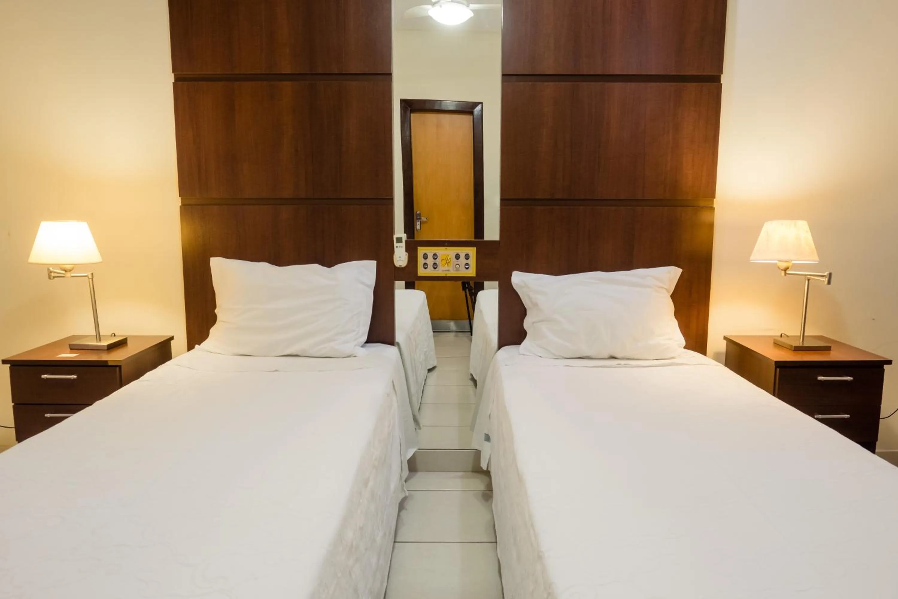 Bed in Ibituruna Center Hotel