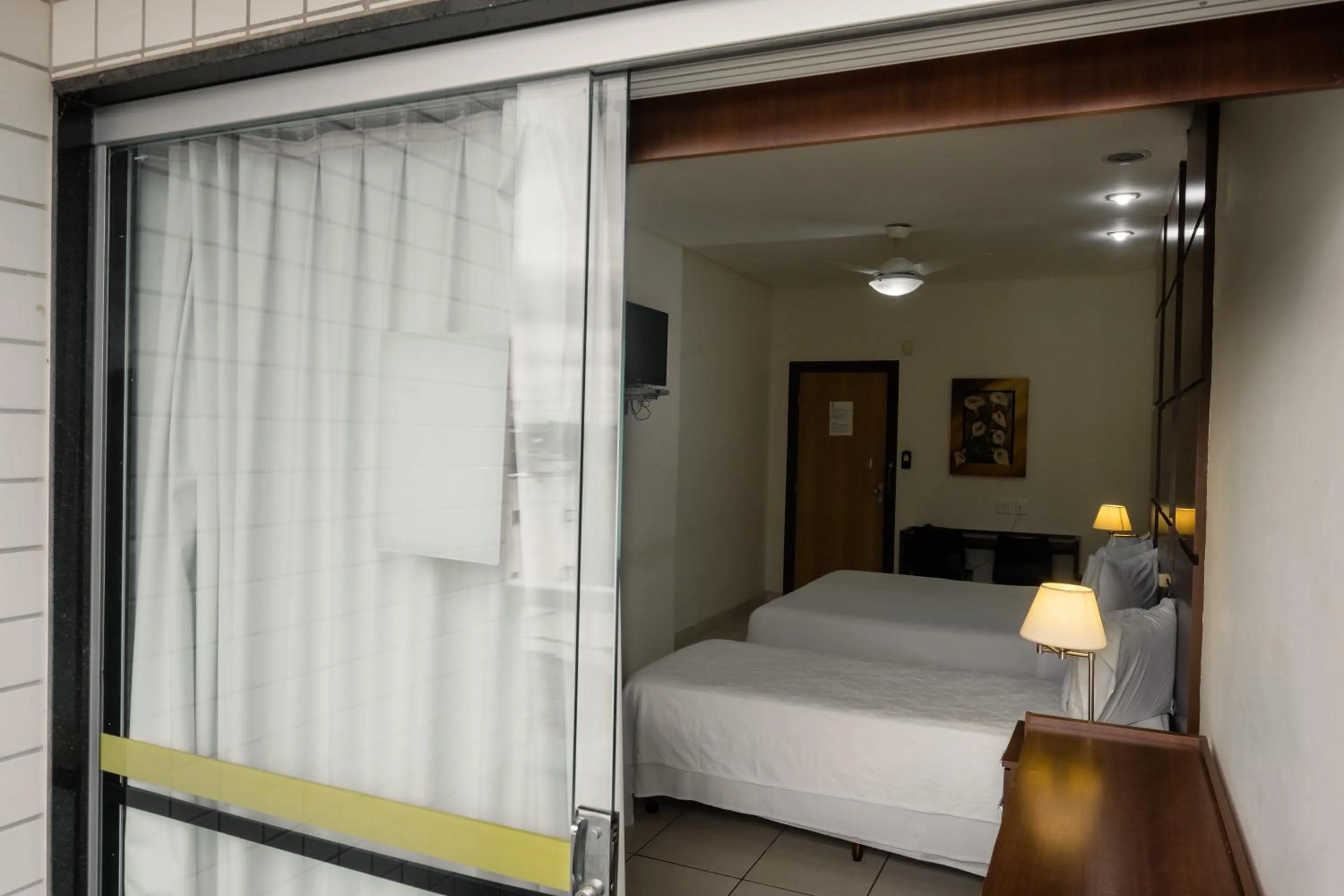 Balcony/Terrace, Bed in Ibituruna Center Hotel