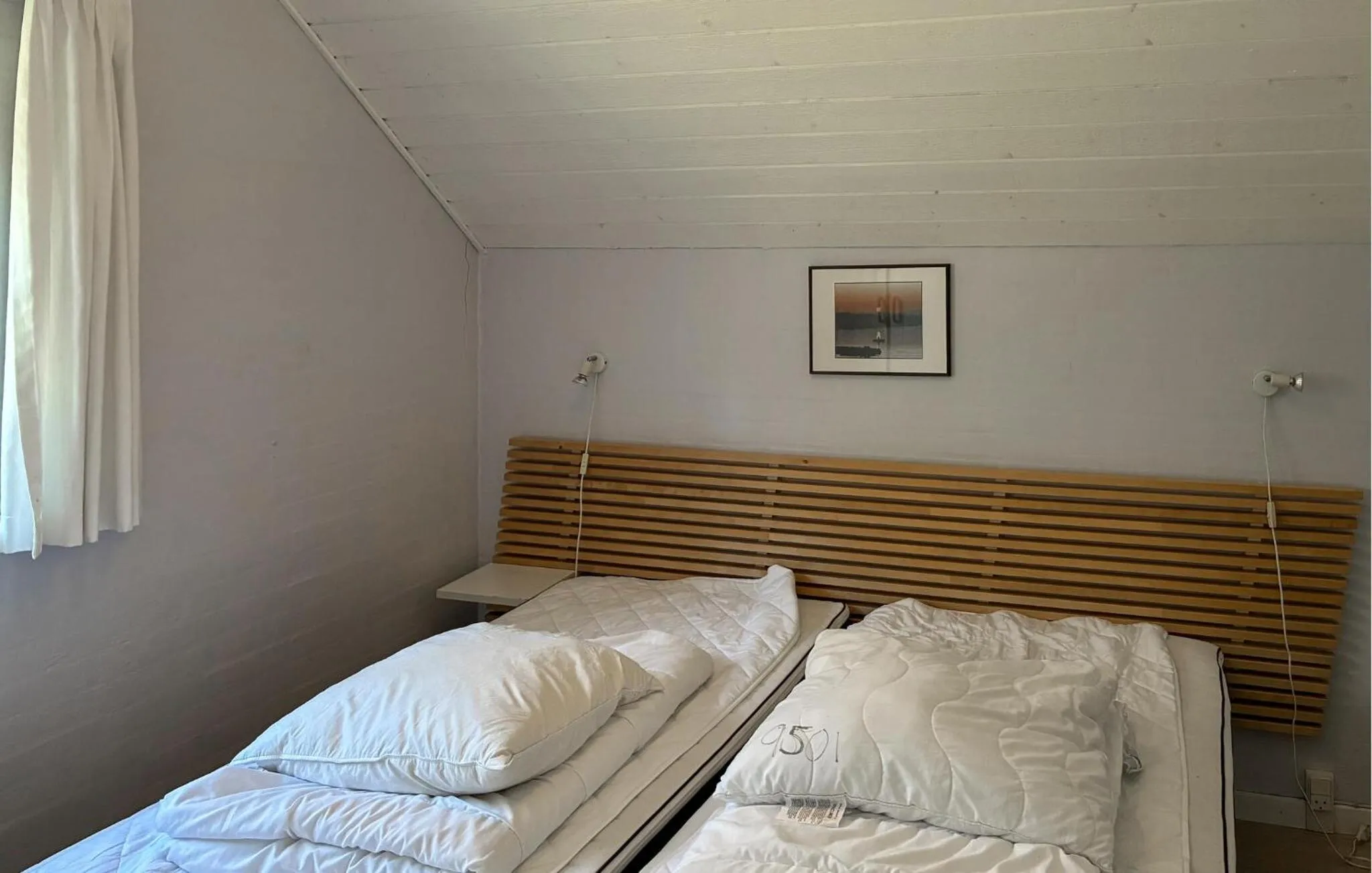 Bed in Lovely Home In Væggerløse With Sauna