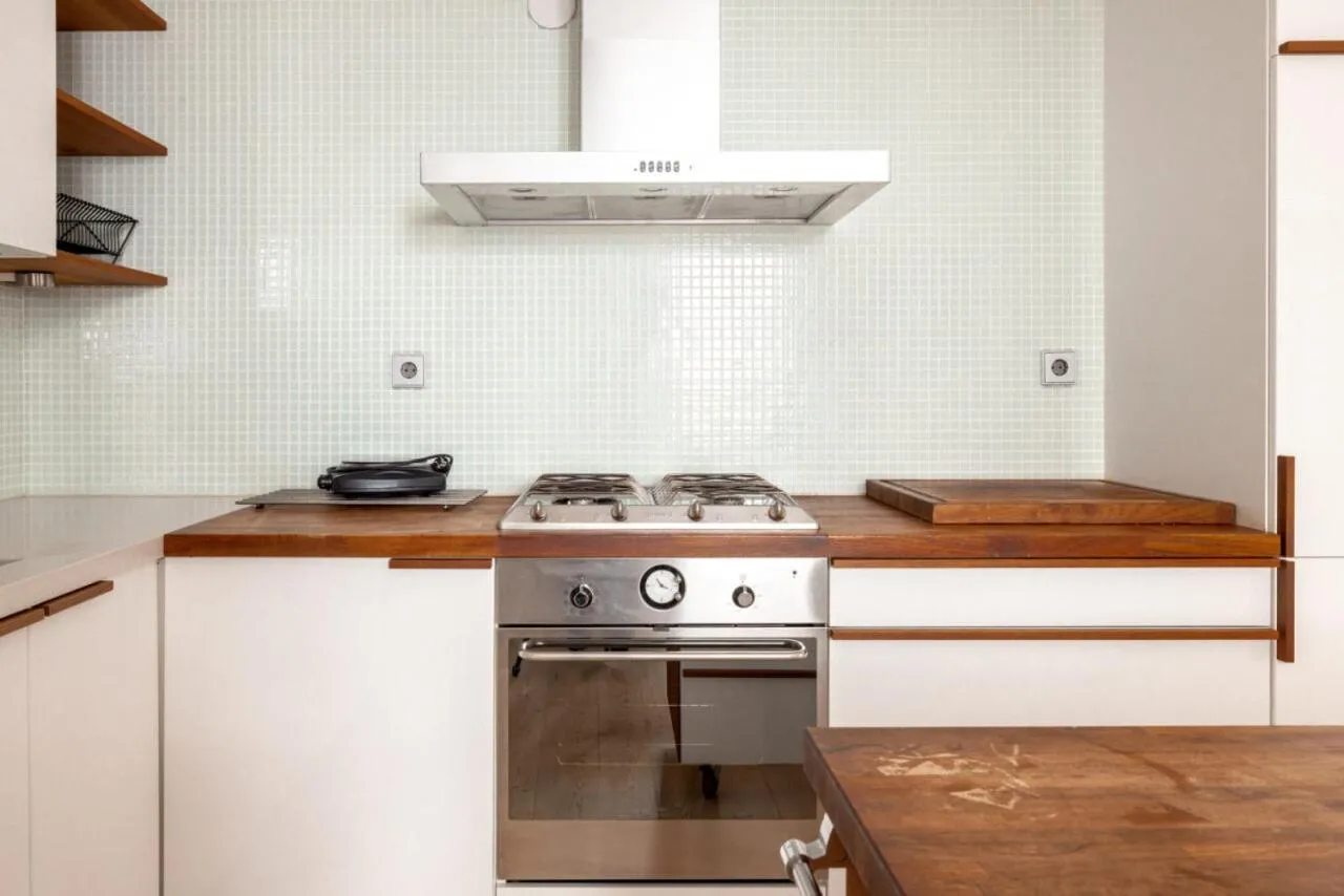 stove in 2ndhomes Loft Apartment with Spa & Balcony by the White Church