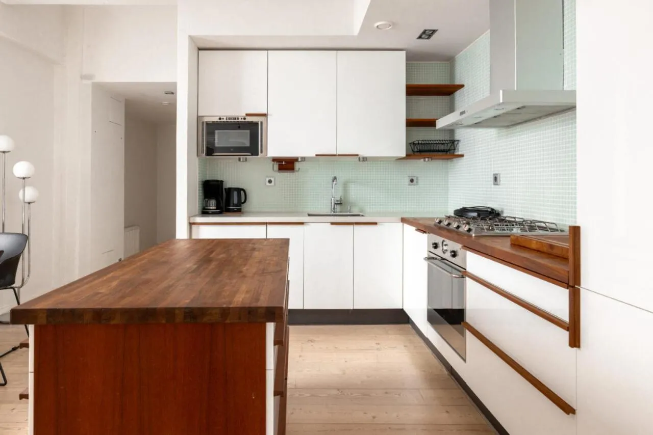 kitchen in 2ndhomes Loft Apartment with Spa & Balcony by the White Church