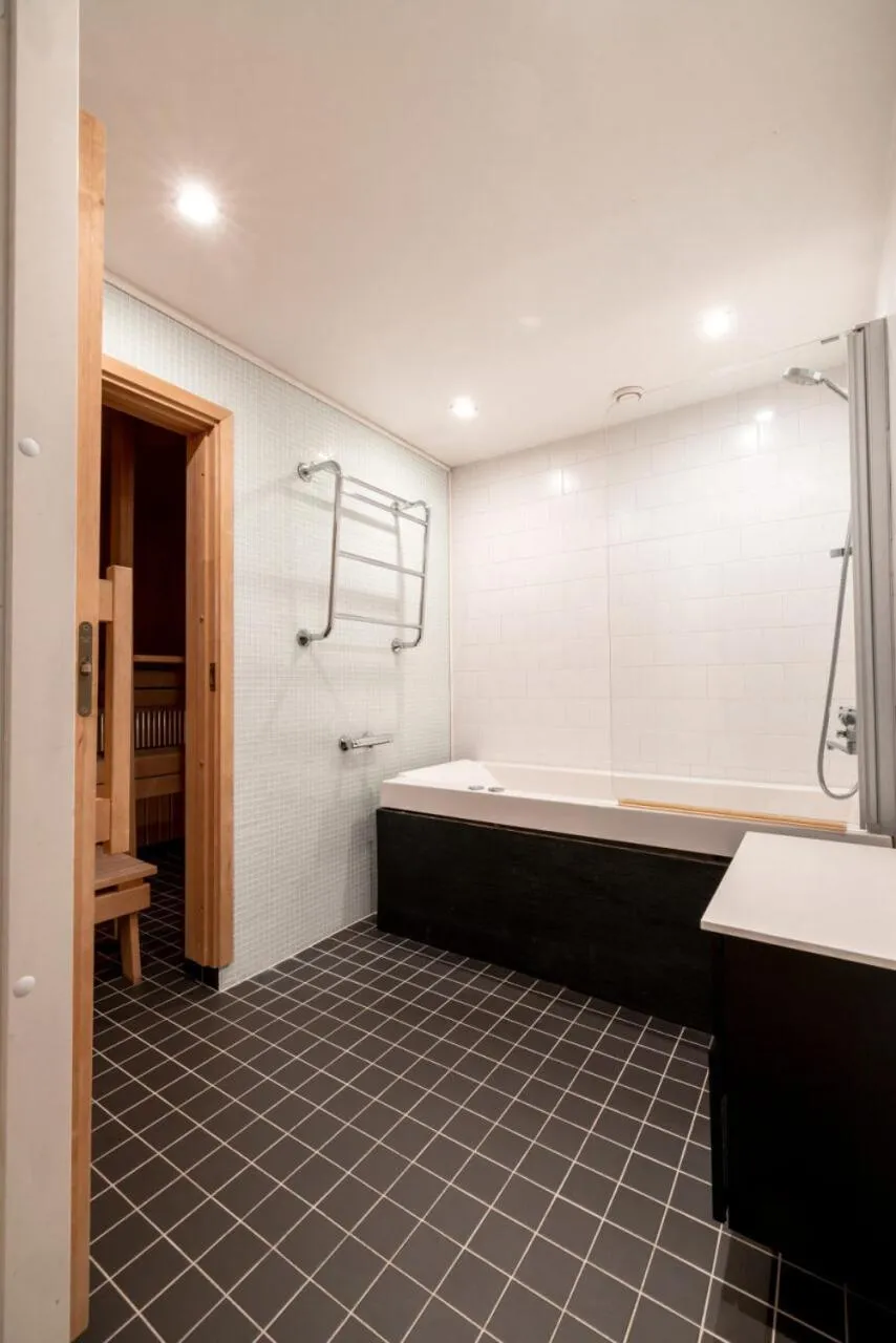 Bathroom in 2ndhomes Loft Apartment with Spa & Balcony by the White Church