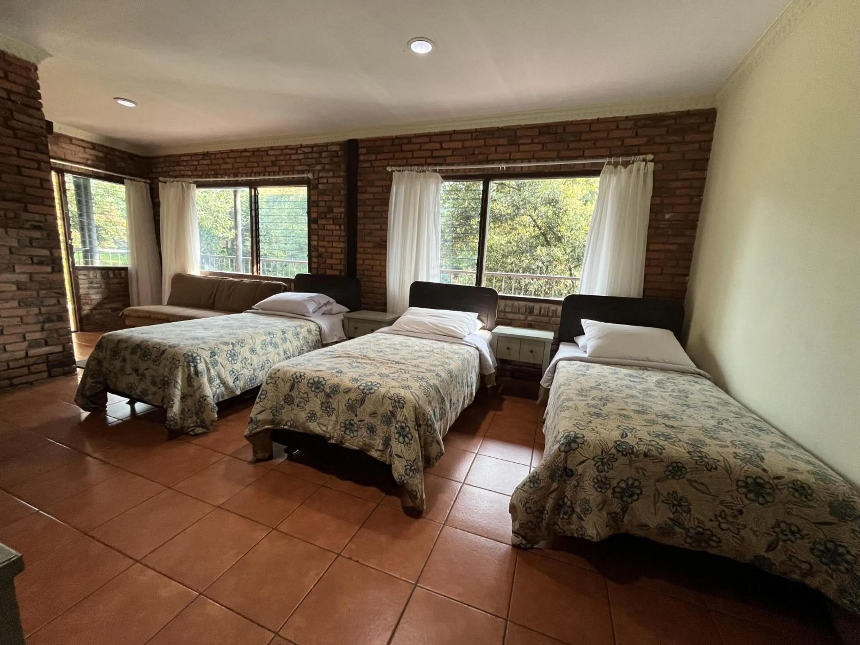 Bed in The Pinewood Lodge and Organic Farm