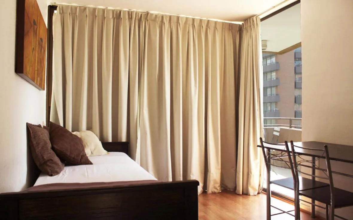 Seating area, Bed in Apartamentos Costanera Centre