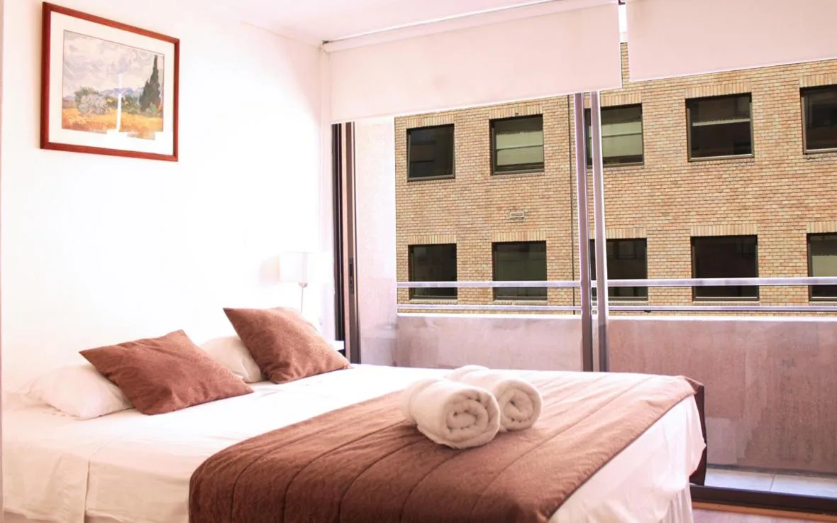 Photo of the whole room, Bed in Apartamentos Costanera Centre