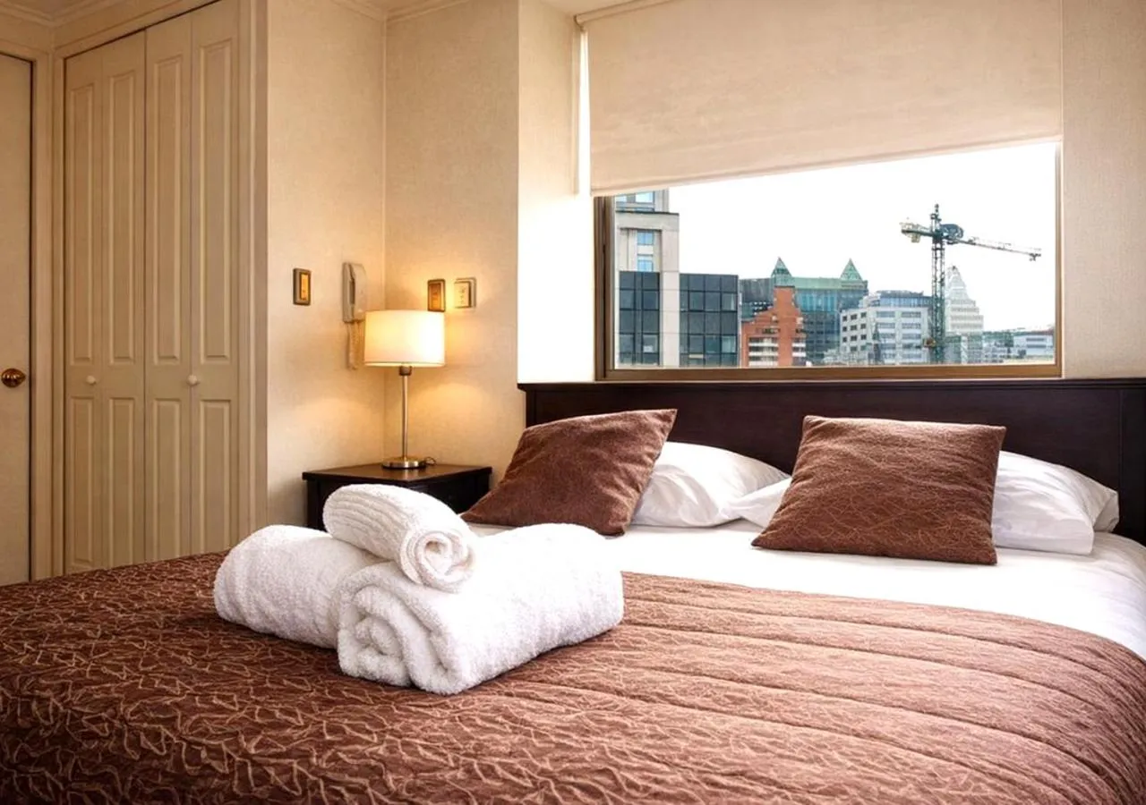 Bed in Apartamentos Costanera Centre